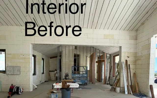 Great room interior with board substrate exposed before plastering (before)