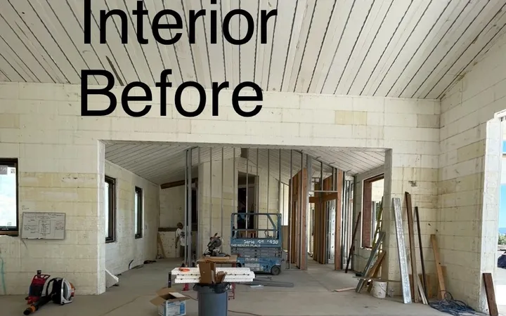 Great room interior with board substrate exposed before plastering (before)